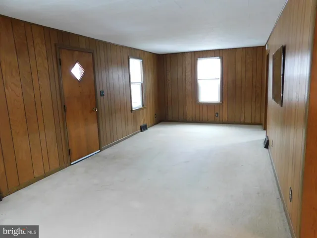a view of hallway with washer and dryer