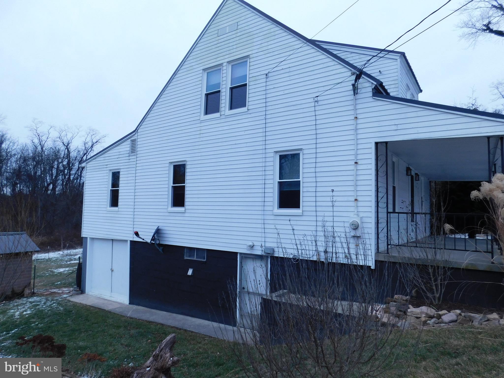122 Loop Road Lewistown, PA 17044 - Photo 38 of 41 a view of a house with backyard and garden