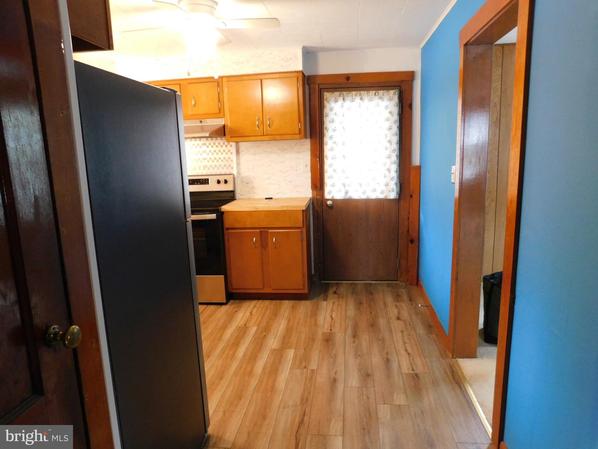 122 Loop Road Lewistown, PA 17044 - Photo 5 of 41 a view of hallway with washer and dryer