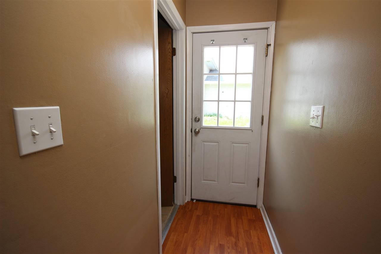 405 Pembroke Road Southwest Poplar Grove, IL 61065 - Photo 2 of 21 an empty room with a window