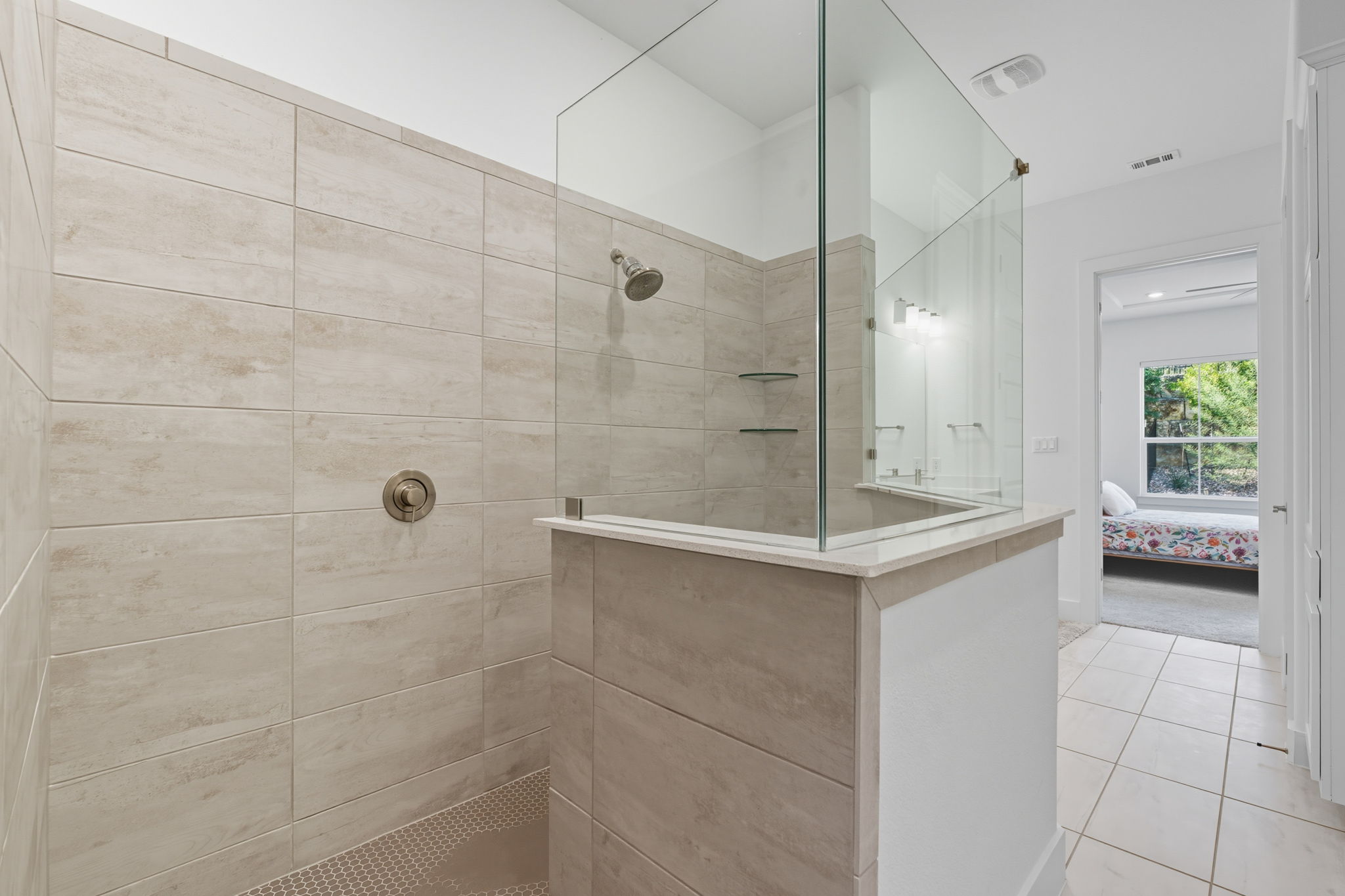 101 Cartwheel Bend, Unit 52 Austin, TX 78738 - Photo 16 of 29 a bathroom with a shower and a sink