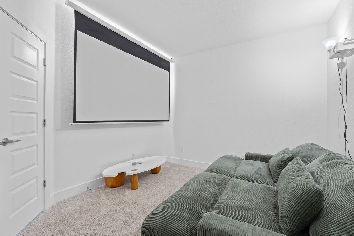 101 Cartwheel Bend, Unit 52 Austin, TX 78738 - Photo 23 of 31 a living room with a couch