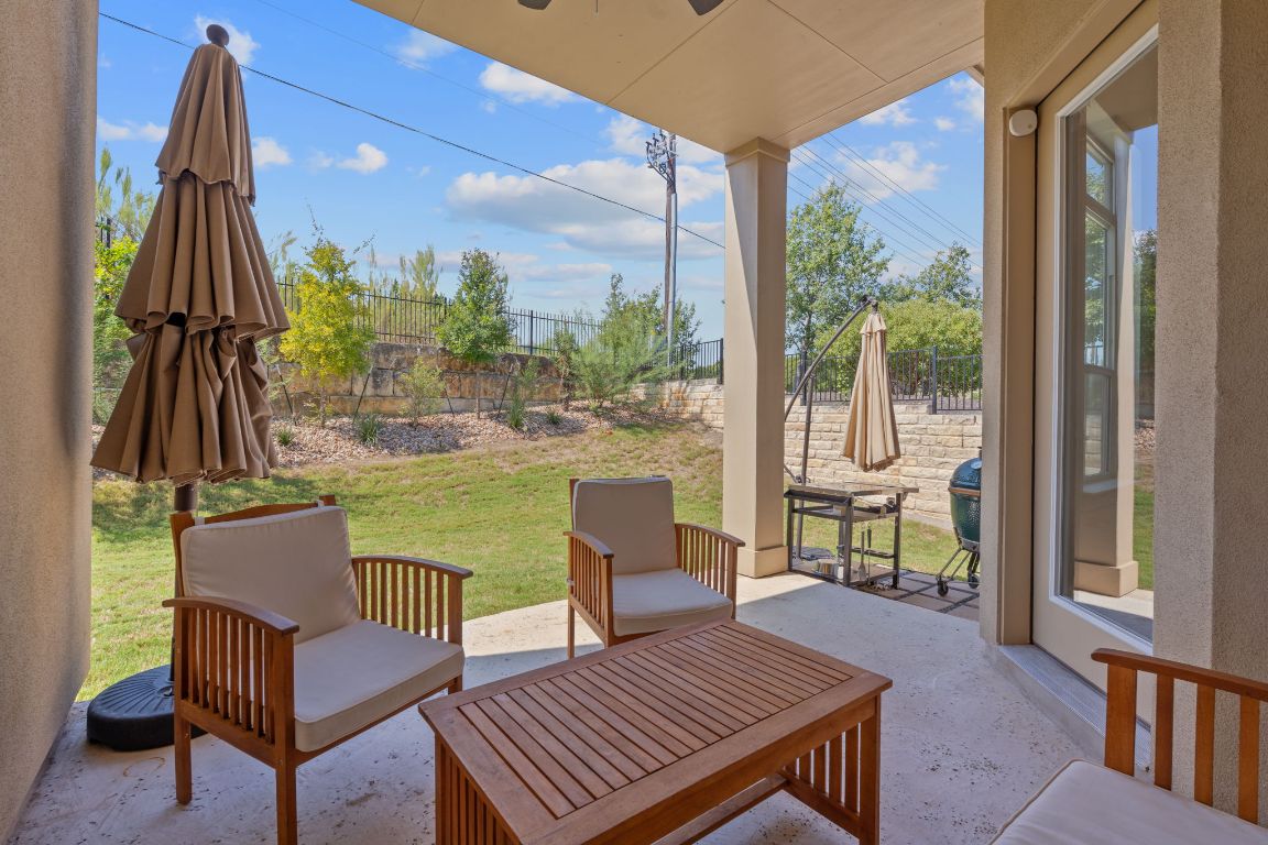 101 Cartwheel Bend, Unit 52 Austin, TX 78738 - Photo 29 of 31 a view of a dining room with furniture window and outside view