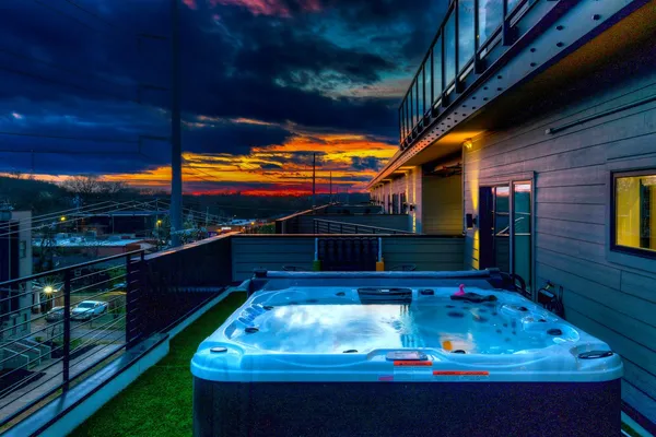 a room with pool table and chairs