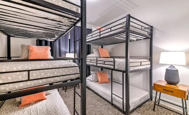 a bedroom with bunk bed
