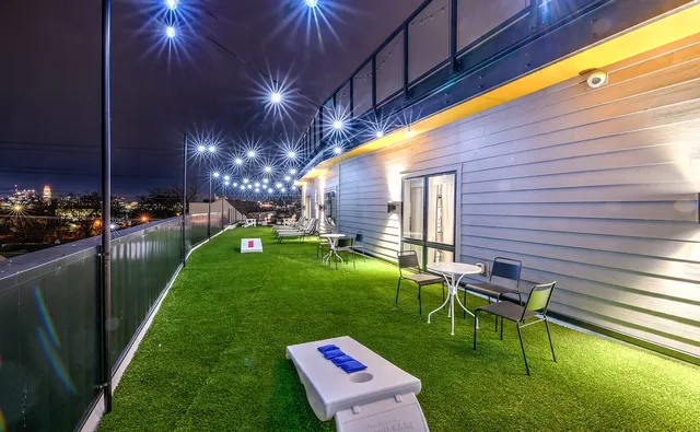 a view of swimming pool having outdoor seating