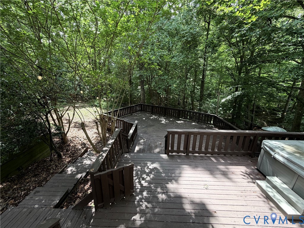 14321 Crossings Ridge Drive Midlothian, VA 23113 - Photo 42 of 43 a view of balcony with wooden floor and outdoor seating
