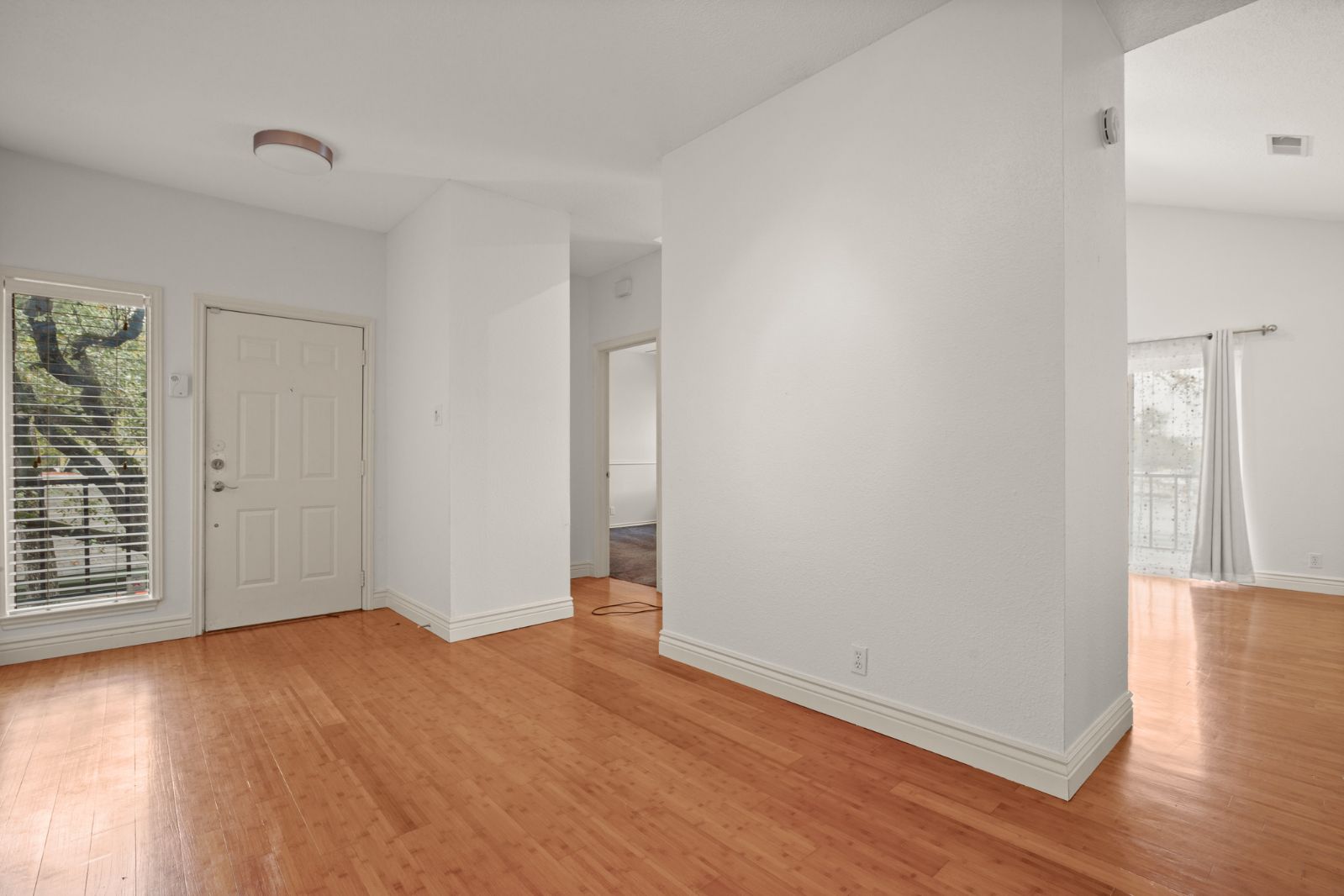 11970 Jollyville Road, Unit 216 Austin, TX 78759 - Photo 9 of 20 Entryway with plenty of natural light and light wood-type flooring