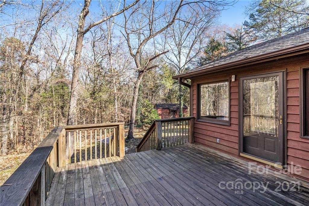 3903 Tater Ridge Road Concord, NC 28025 - Photo 21 of 34 a view of deck with wooden floor and outdoor seating