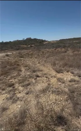 a view of ocean and a mountain