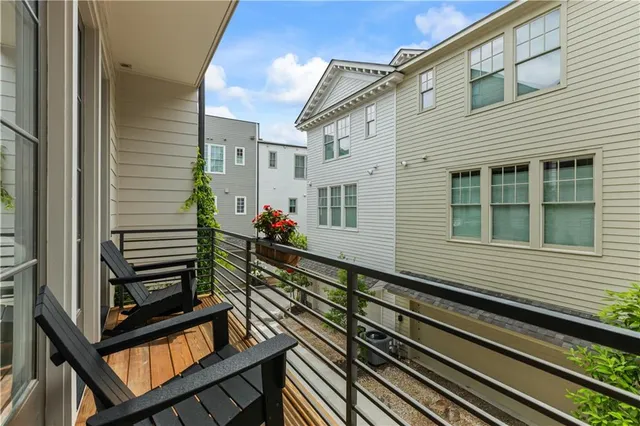 a view of a train that is sitting on the tracks