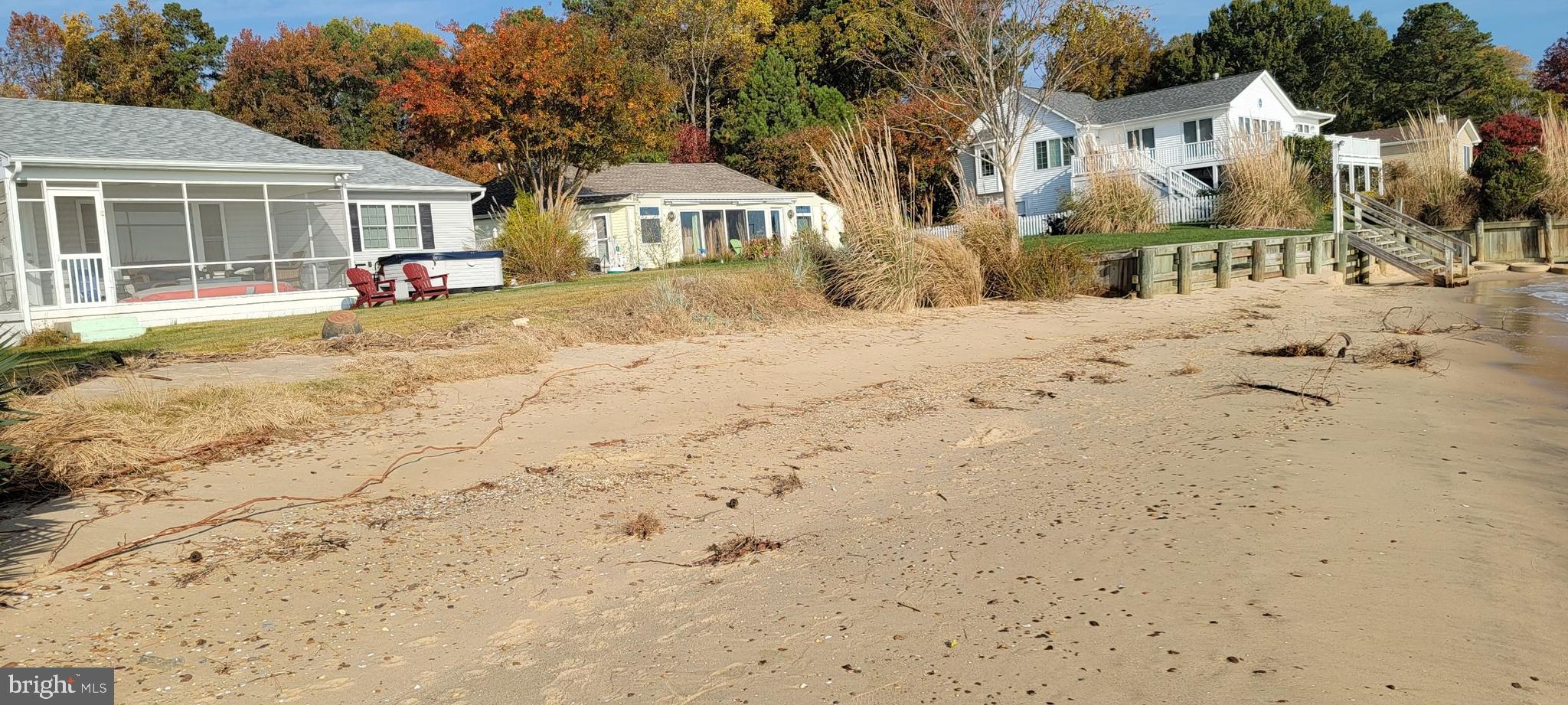 12880 Bay Drive Lusby, MD 20657 - Photo 7 of 9 a view of large house with a snow on the road
