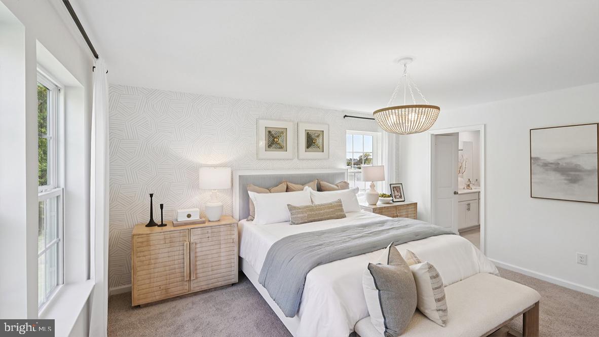 505 Scotty Boulevard, Unit 1302 Rio Grande, NJ 08242 - Photo 29 of 55 a bedroom with a large bed and a window