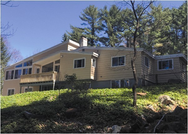 28 Patterson Road Lexington, MA 02421 - Photo 2 of 6 a front view of a house with a yard
