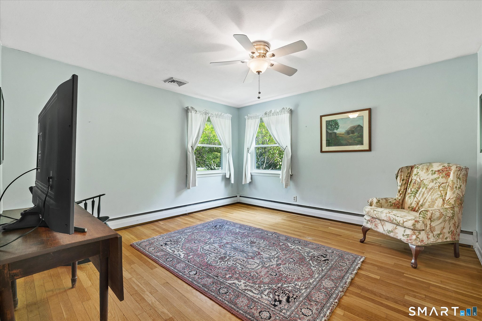 19 Beckwith Street Killingly, CT 06239 - Photo 24 of 39 a living room with a rug