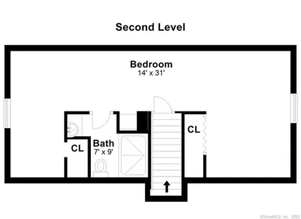 a front view of a house with a yard and a garage