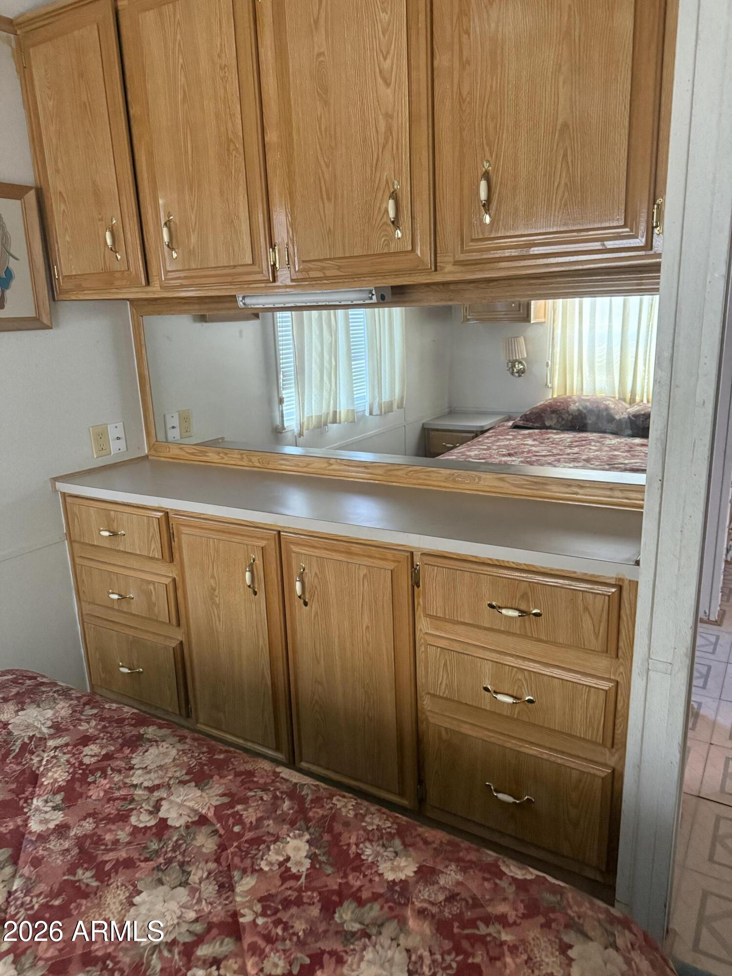 7750 East Broadway Road, Unit 406 Mesa, AZ 85208 - Photo 12 of 36 a room with cabinets