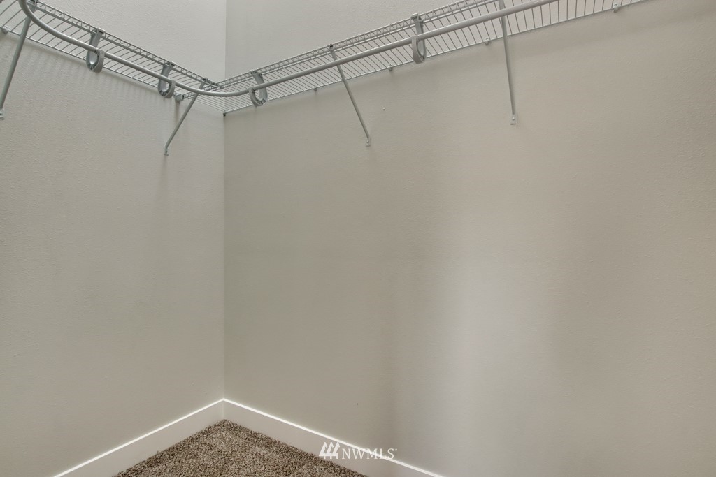3116 Southeast 6th Street Renton, WA 98058 - Photo 15 of 20 a view of a room with racks on the wall