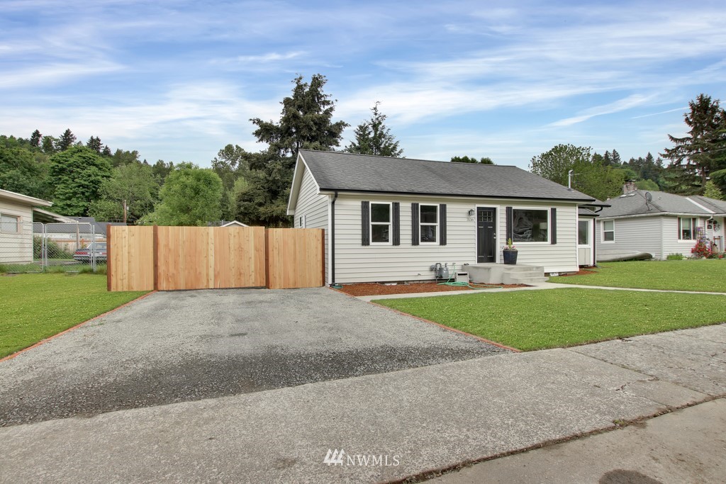 3116 Southeast 6th Street Renton, WA 98058 - Photo 3 of 20 front view of a house with a yard