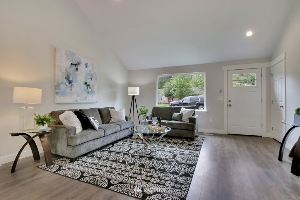 3116 Southeast 6th Street Renton, WA 98058 - Photo 5 of 20 a living room with furniture and a large window