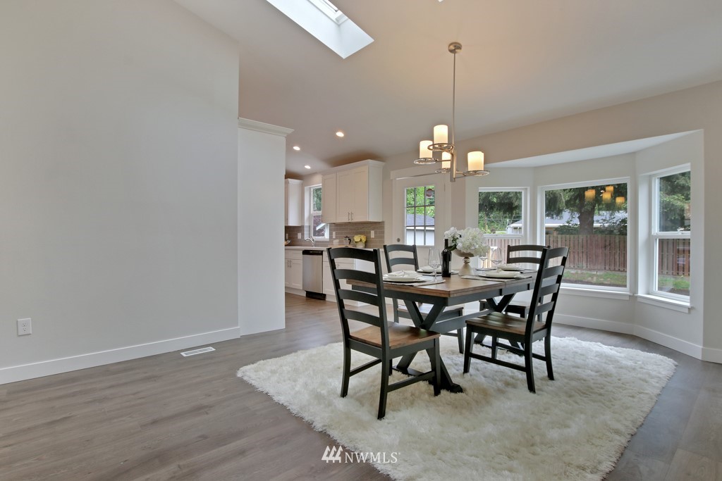 3116 Southeast 6th Street Renton, WA 98058 - Photo 8 of 20 a view of a dining room with furniture and window