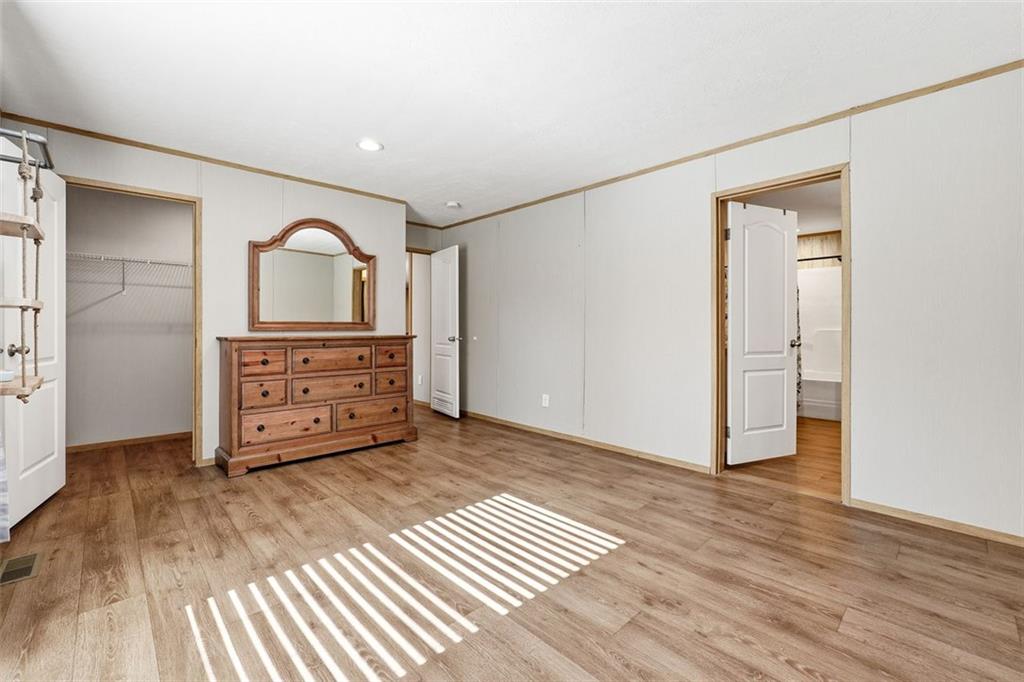 158 Woodsmoke Road Rockmart, GA 30153 - Photo 12 of 25 a room with a dresser and a mirror