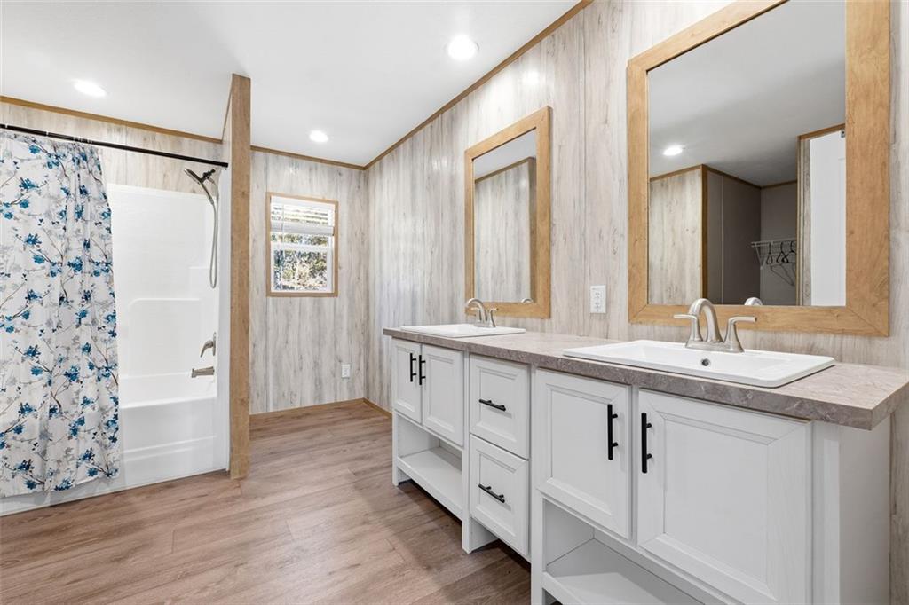158 Woodsmoke Road Rockmart, GA 30153 - Photo 14 of 25 a bathroom with a double vanity sink mirror and shower
