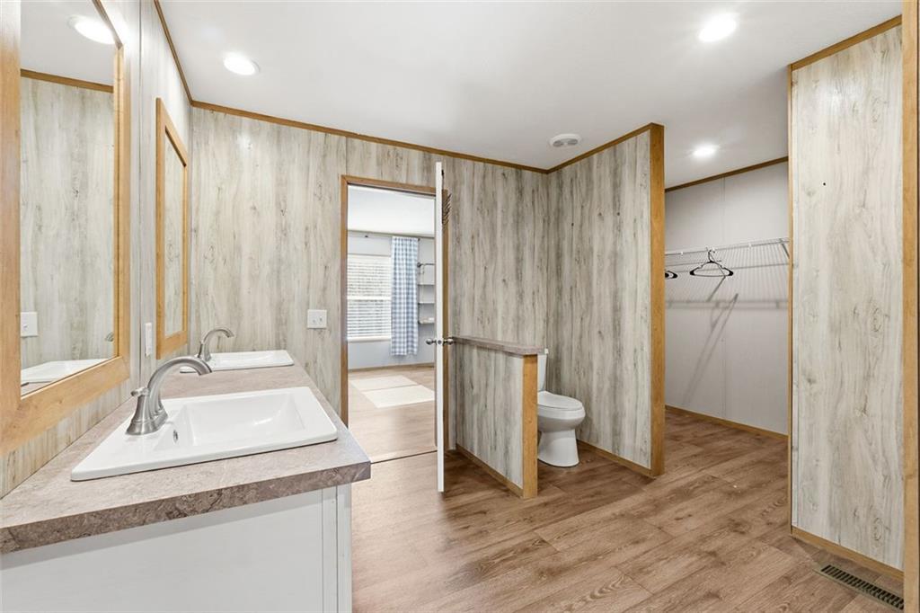 158 Woodsmoke Road Rockmart, GA 30153 - Photo 15 of 25 a bathroom with a sink and a large mirror