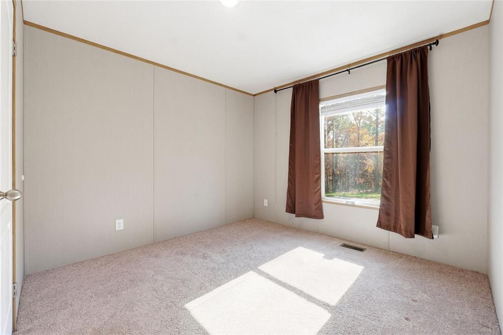 158 Woodsmoke Road Rockmart, GA 30153 - Photo 16 of 25 a view of an empty room with a window