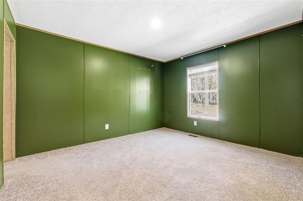 158 Woodsmoke Road Rockmart, GA 30153 - Photo 20 of 25 a view of an empty room with window and closet