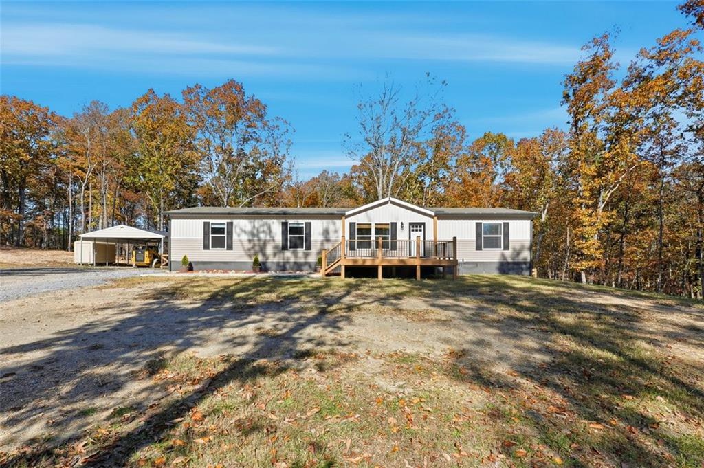 158 Woodsmoke Road Rockmart, GA 30153 - Photo 2 of 25 a view of a house with a yard