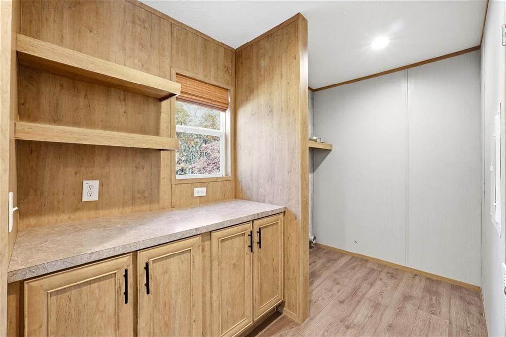 158 Woodsmoke Road Rockmart, GA 30153 - Photo 21 of 25 a kitchen with a sink and a refrigerator