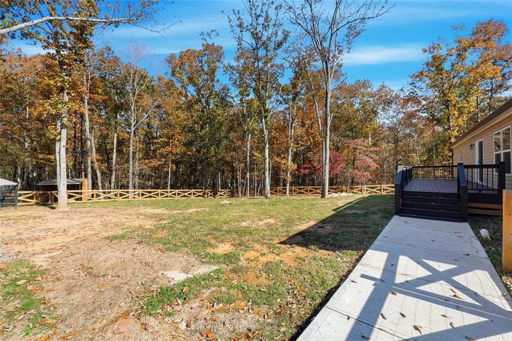 158 Woodsmoke Road Rockmart, GA 30153 - Photo 24 of 25 a view of a yard with wooden fence