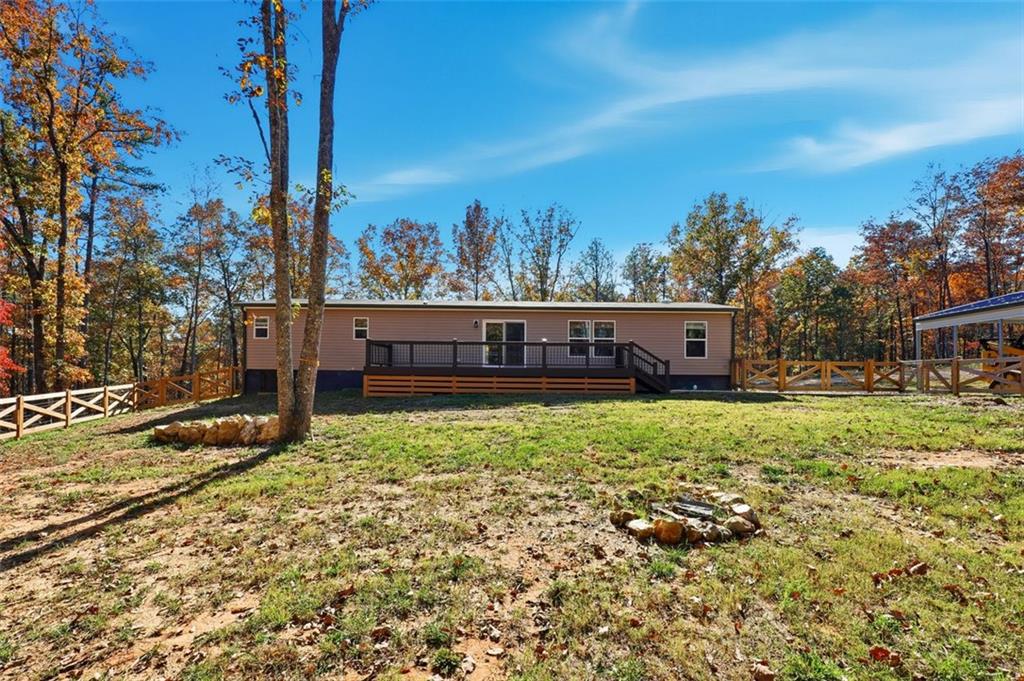 158 Woodsmoke Road Rockmart, GA 30153 - Photo 25 of 25 a view of a house with a yard