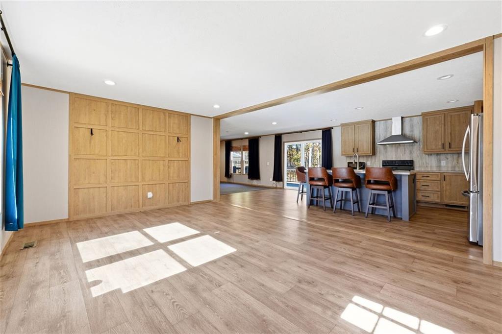 158 Woodsmoke Road Rockmart, GA 30153 - Photo 4 of 25 a living room with furniture and a wooden floor