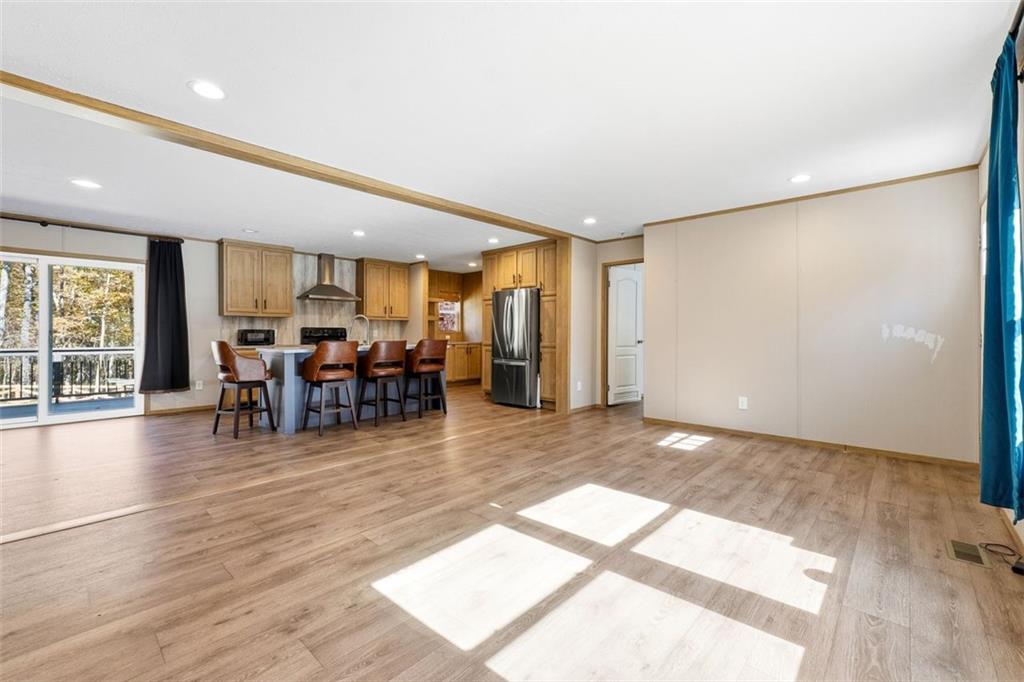 158 Woodsmoke Road Rockmart, GA 30153 - Photo 5 of 25 a view of a room with furniture and wooden floor