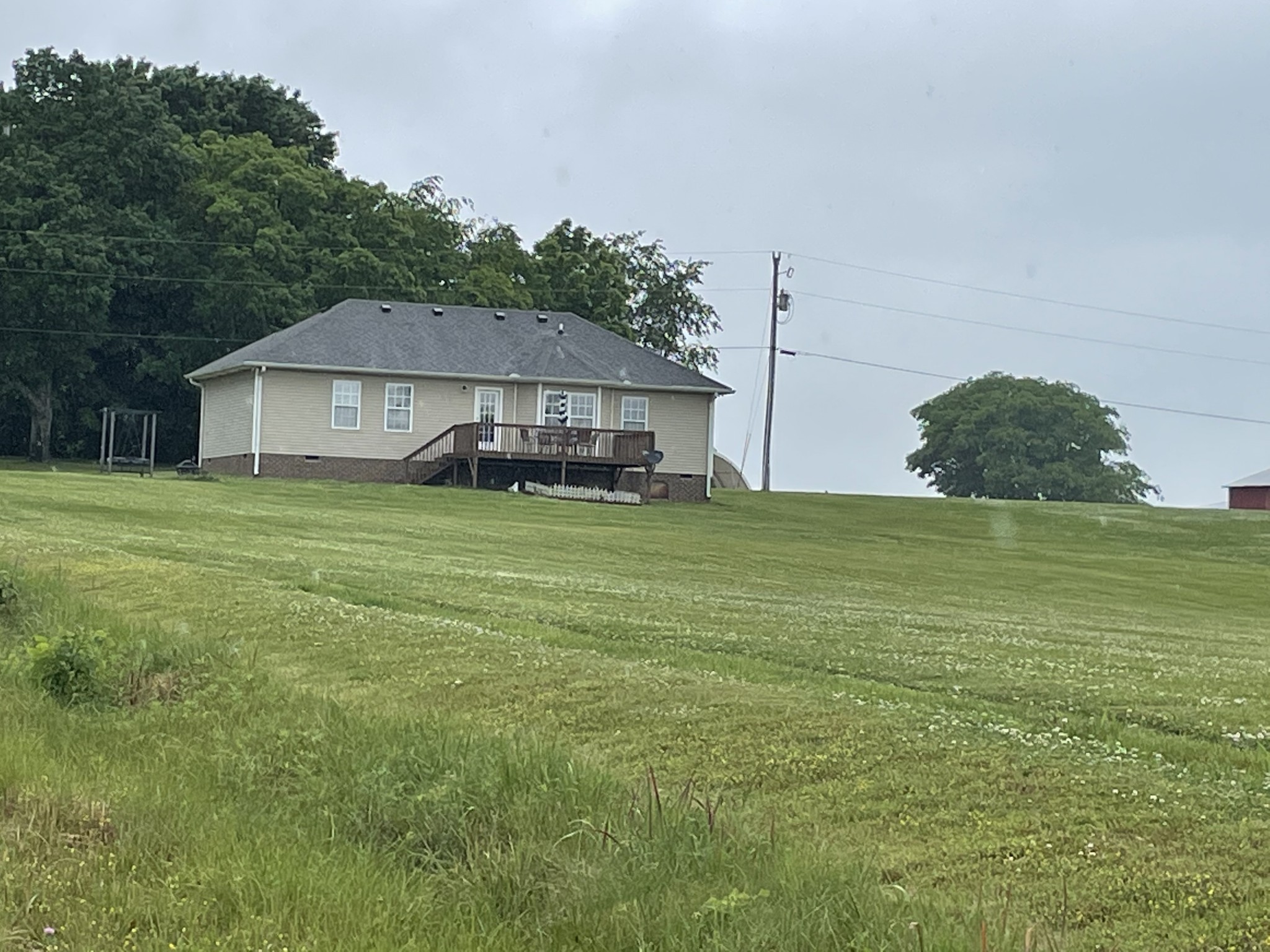 5235 Youngville Road Springfield, TN 37172 - Photo 3 of 28 a view of a house with a yard and garage