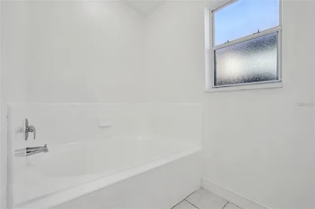 a bathroom with a bathtub