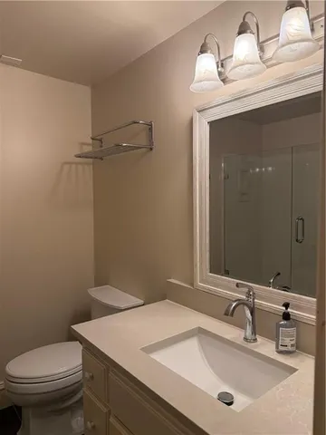 a bathroom with a sink and a toilet
