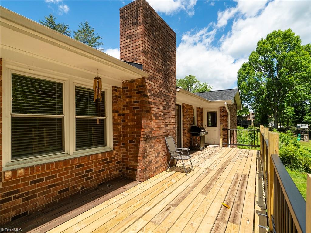 5531 Davis Road Walkertown, NC 27051 - Photo 4 of 30 Spacious deck overlooking quiet backyard with own entrance to primary bedroom