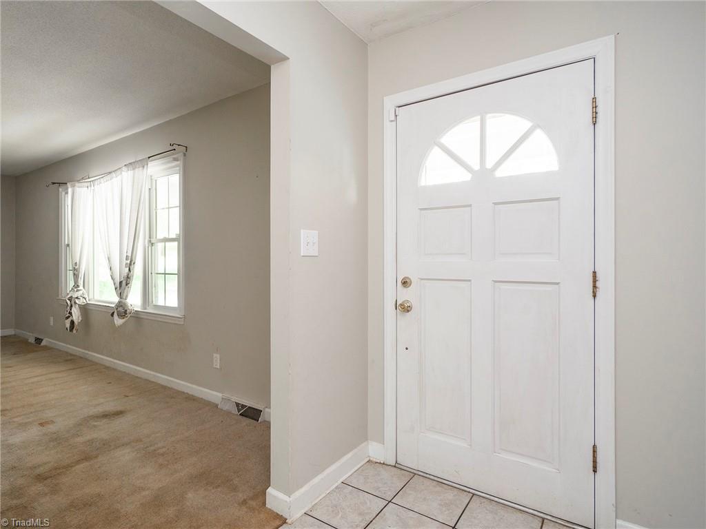 5531 Davis Road Walkertown, NC 27051 - Photo 7 of 30 Foyer with tile floor leading to the formal living