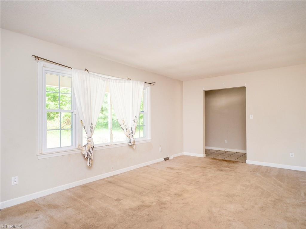 5531 Davis Road Walkertown, NC 27051 - Photo 8 of 30 Formal living room with windows overlooking the front yard