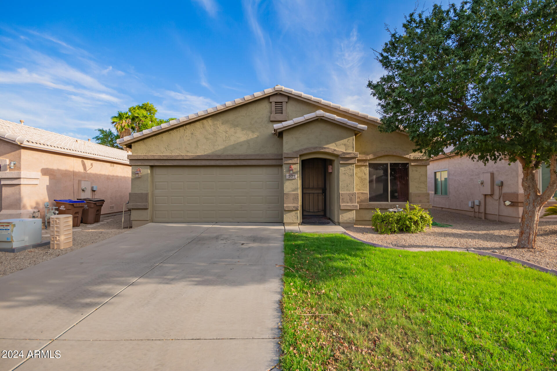 321 East Cheyenne Road San Tan Valley, AZ 85143 - Photo 1 of 33 a view of a house with a yard and sitting area