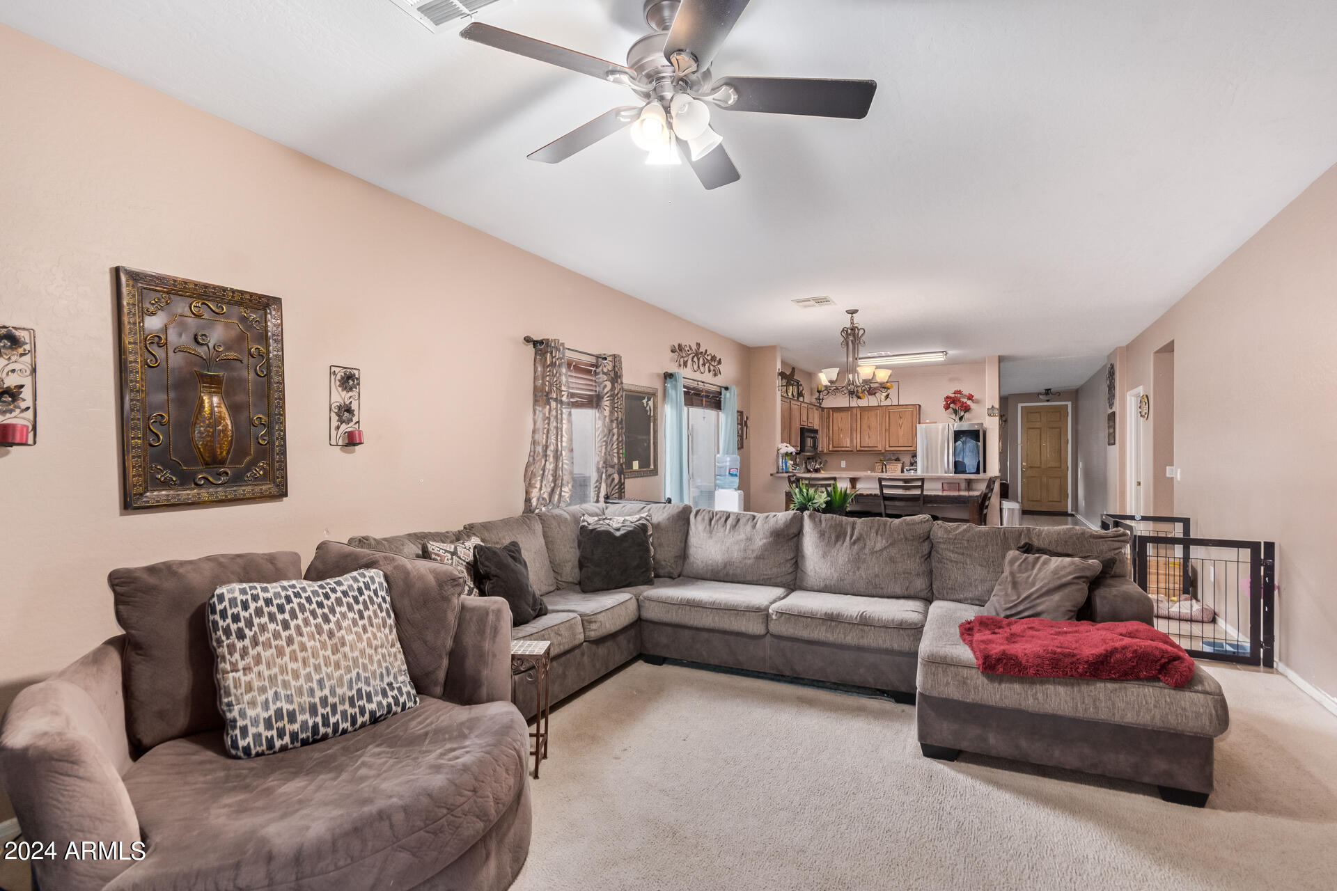 321 East Cheyenne Road San Tan Valley, AZ 85143 - Photo 13 of 33 a living room with furniture and a couch