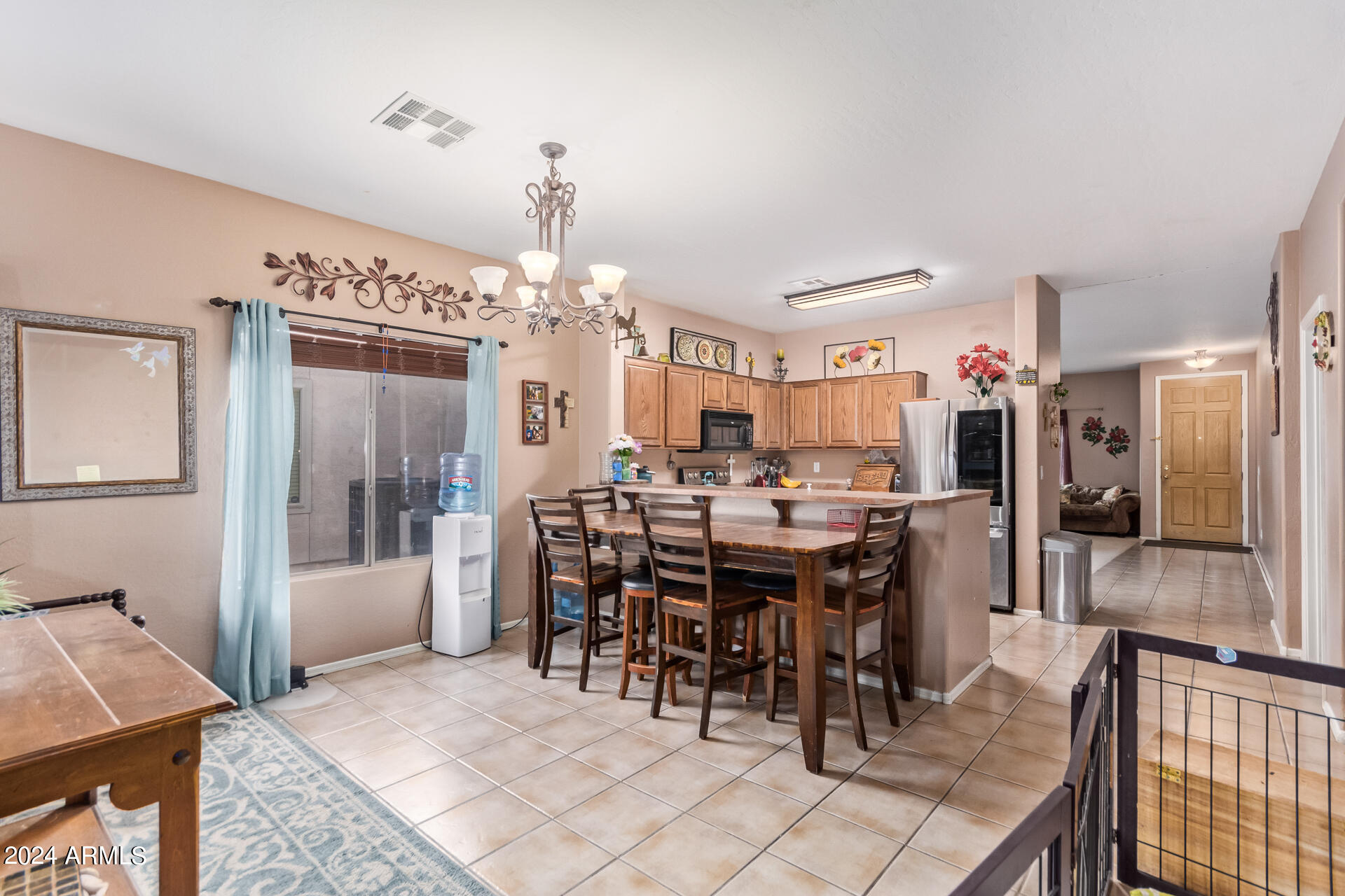 321 East Cheyenne Road San Tan Valley, AZ 85143 - Photo 15 of 33 a view of a dining room with furniture
