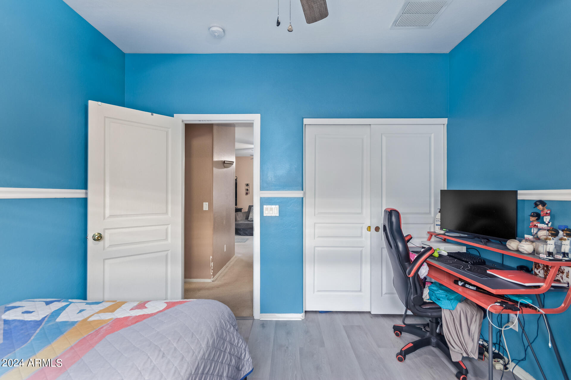321 East Cheyenne Road San Tan Valley, AZ 85143 - Photo 29 of 33 a bedroom with a bed and a flat screen tv