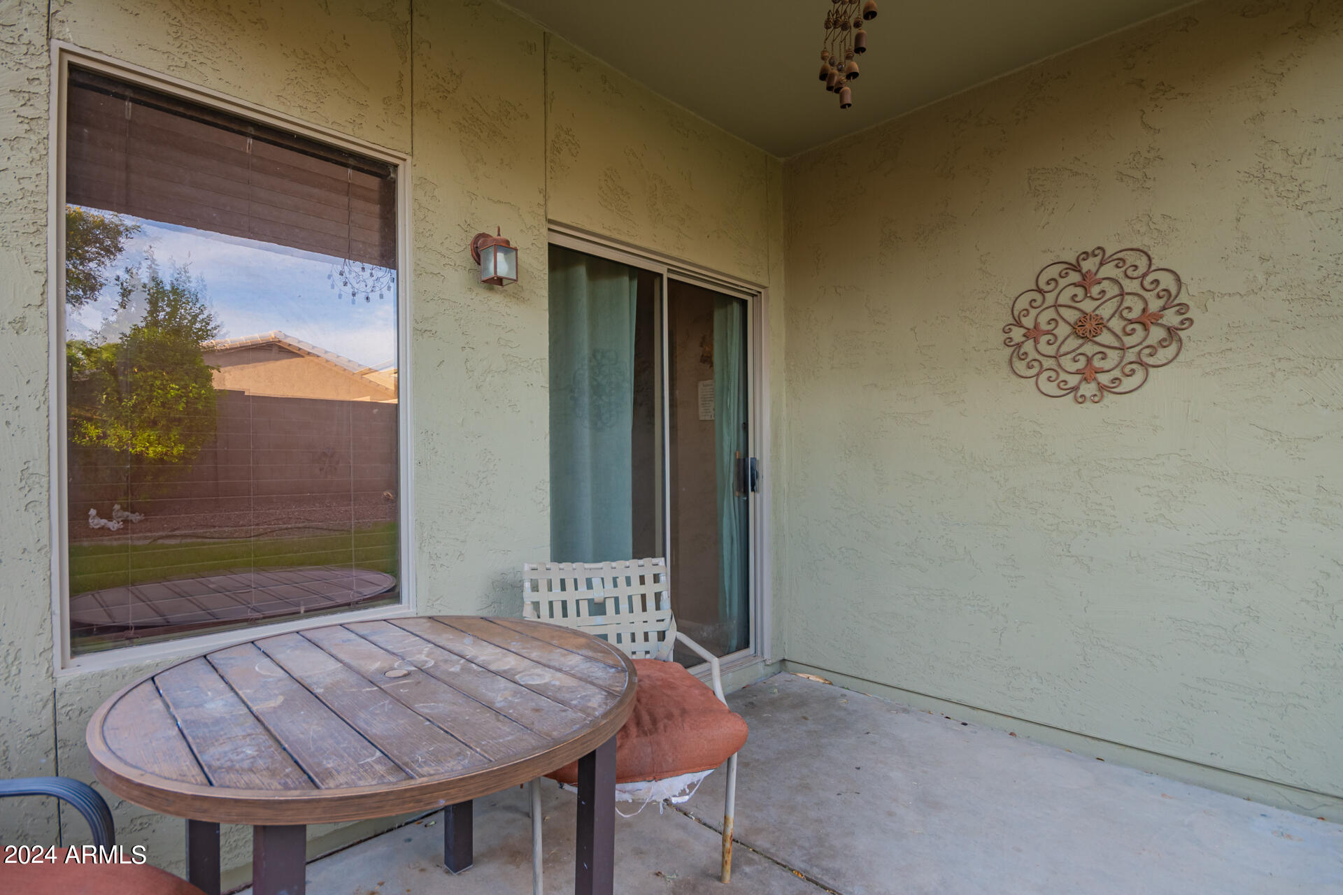 321 East Cheyenne Road San Tan Valley, AZ 85143 - Photo 31 of 33 a view of a balcony with table and chairs