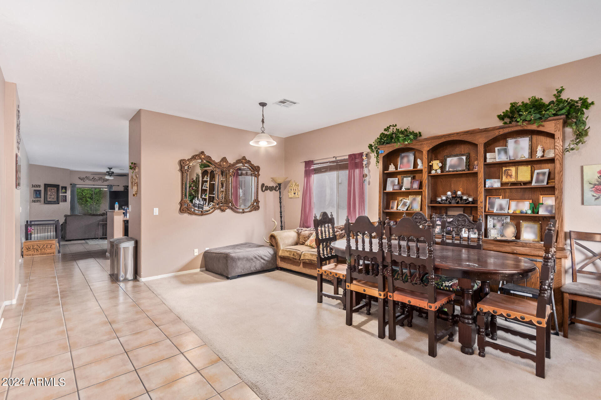 321 East Cheyenne Road San Tan Valley, AZ 85143 - Photo 9 of 33 a view of a livingroom with furniture and a couch