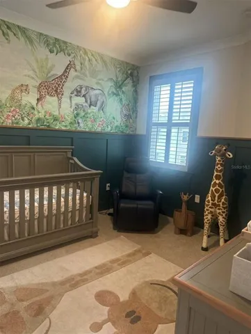 a bathroom with a toilet sink and shower