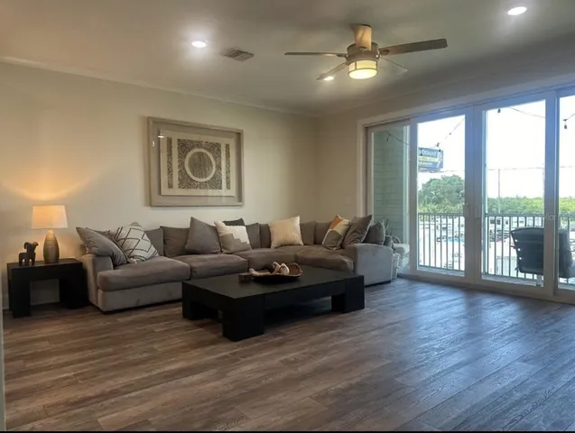 a large kitchen with stainless steel appliances lots of counter space and a refrigerator